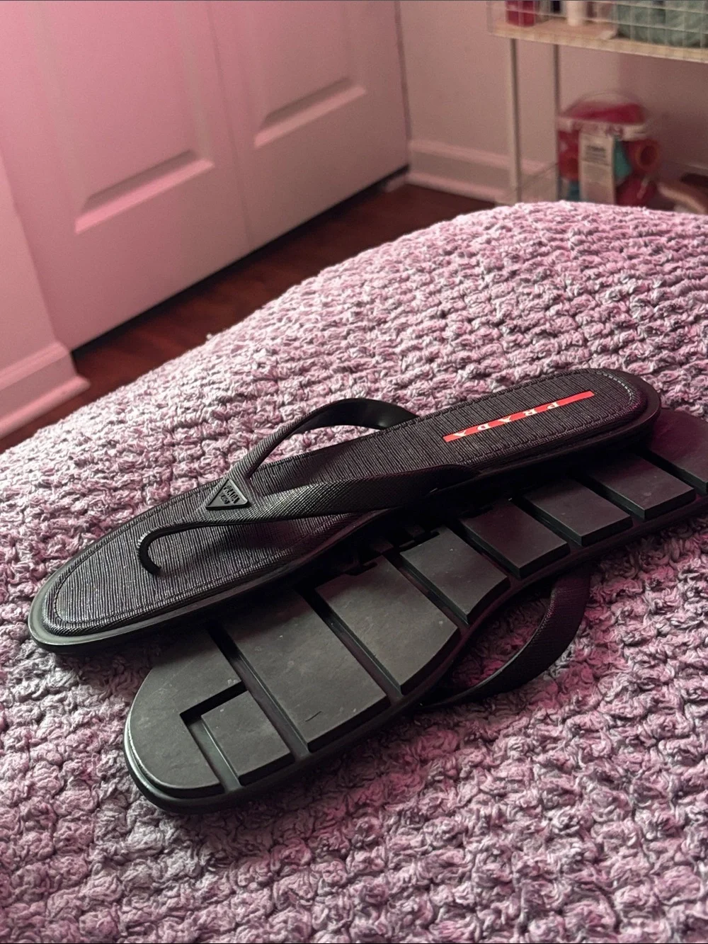 Prada Men’s Black Flip-Flop Sandals with Red Logo Accent
